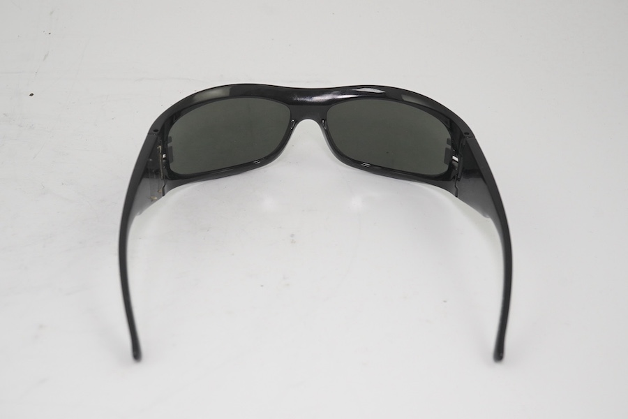Two Gucci cased sunglasses, Rayban and another